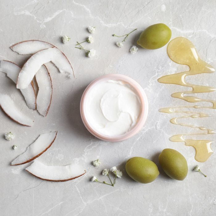 Beautiful composition with jar of cream on light background