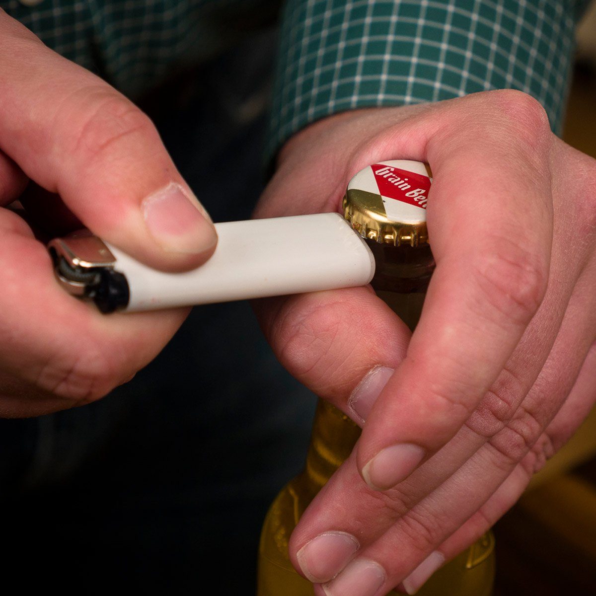 Opening bottle with a lighter