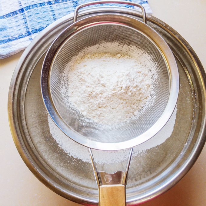 Sifting Flour for Jamaican Coco Bread