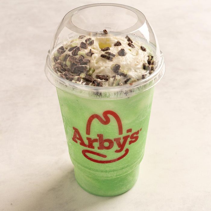 Arby's mint shake on a stone countertop