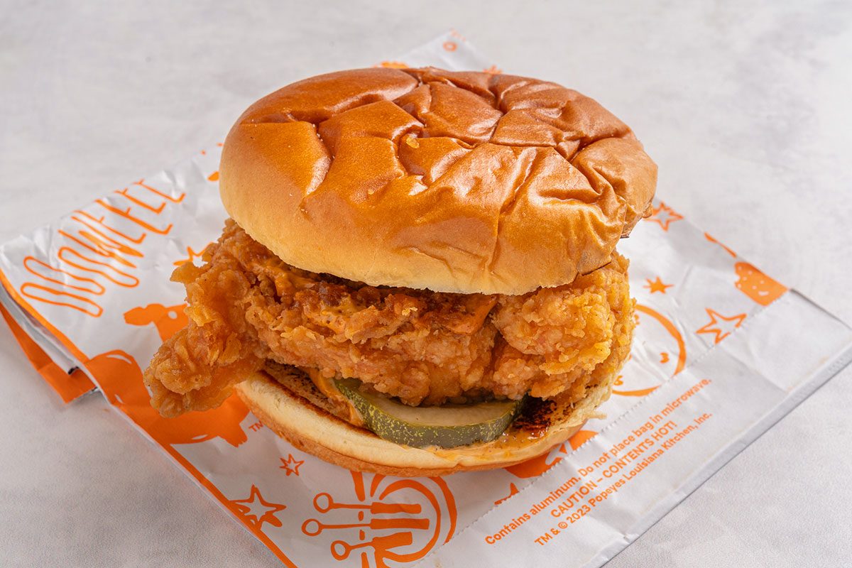 Popeye's crispy sandwich on a table